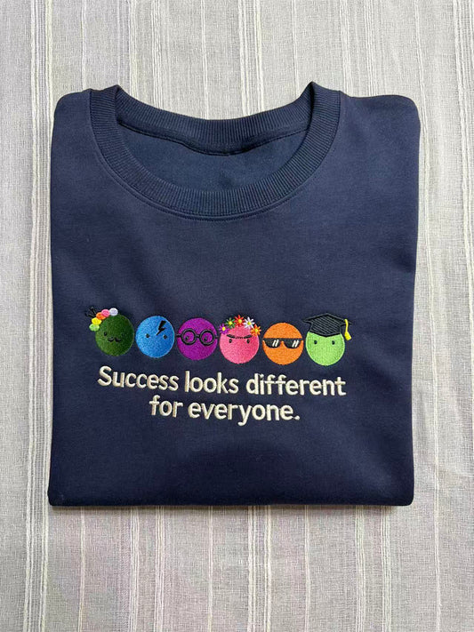 "Success Looks Different For Everyone" Embroidered Crewneck Sweatshirt