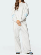 Ensemble de sweat à capuche et pantalon oversize pour femmes à imprimé coquette avec détails ruban